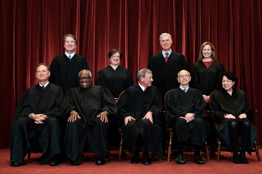 WASHINGTON, DC - APRIL 23: Members of the Supreme Court pose for a group photo at the Supreme Court in Washington, DC on April 23, 2021. Seated from left: Associate Justice Samuel Alito, Associate Justice Clarence Thomas, Chief Justice John Roberts, Associate Justice Stephen Breyer and Associate Justice Sonia Sotomayor, Standing from left: Associate Justice Brett Kavanaugh, Associate Justice Elena Kagan, Associate Justice Neil Gorsuch and Associate Justice Amy Coney Barrett. (Photo by Erin Schaff-Pool/Getty Images)