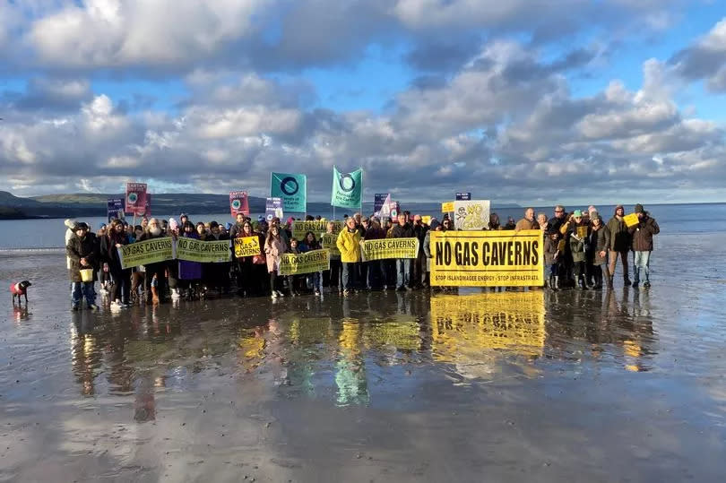 Boots on the Beach against Larne lough Gas Caverns, January 2024