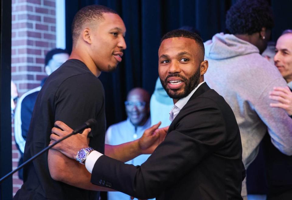 Charlotte Hornets executive vice president of basketball operations Jeff Peterson greets Grant Williams and others after a press conference announcing his role with the organization at Spectrum Center on Wednesday, March 6, 2024. In this role, Peterson becomes the organization’s chief basketball decision-maker while also being responsible for leading the team’s day-to-day basketball operations.