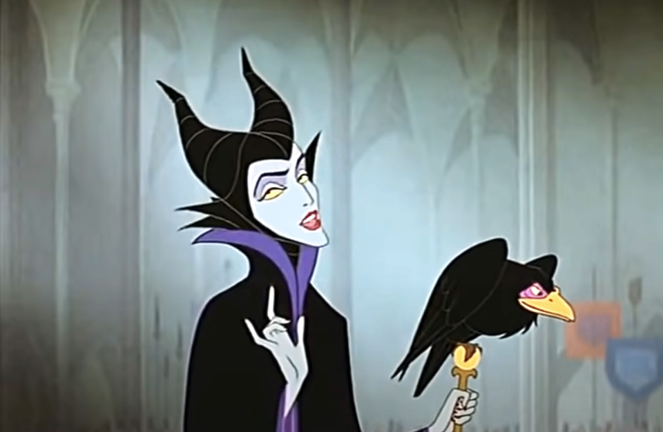 animated Maleficent holding a crow