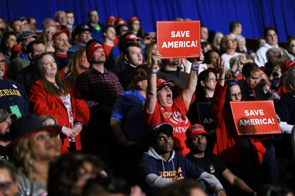 Supporters cheer during a rally held by former President Donald Trump in Washington Township, Michigan, April 2, 2022. / Credit: EMILY ELCONIN / REUTERS