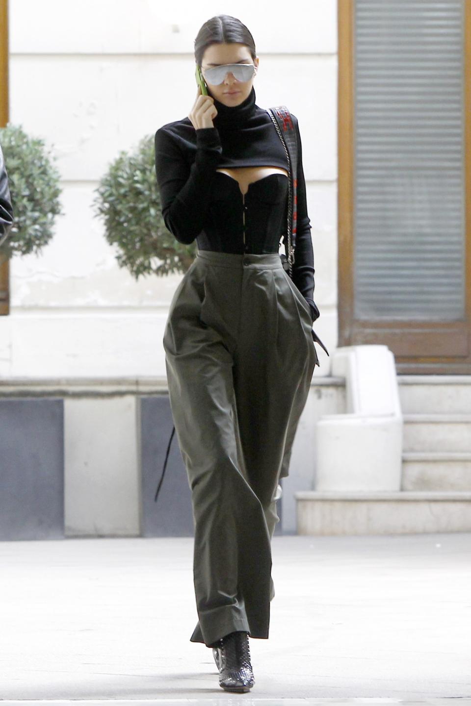 <p>When in Paris… the model stunned in a corset and wide leg trousers. [Photo: Getty] </p>