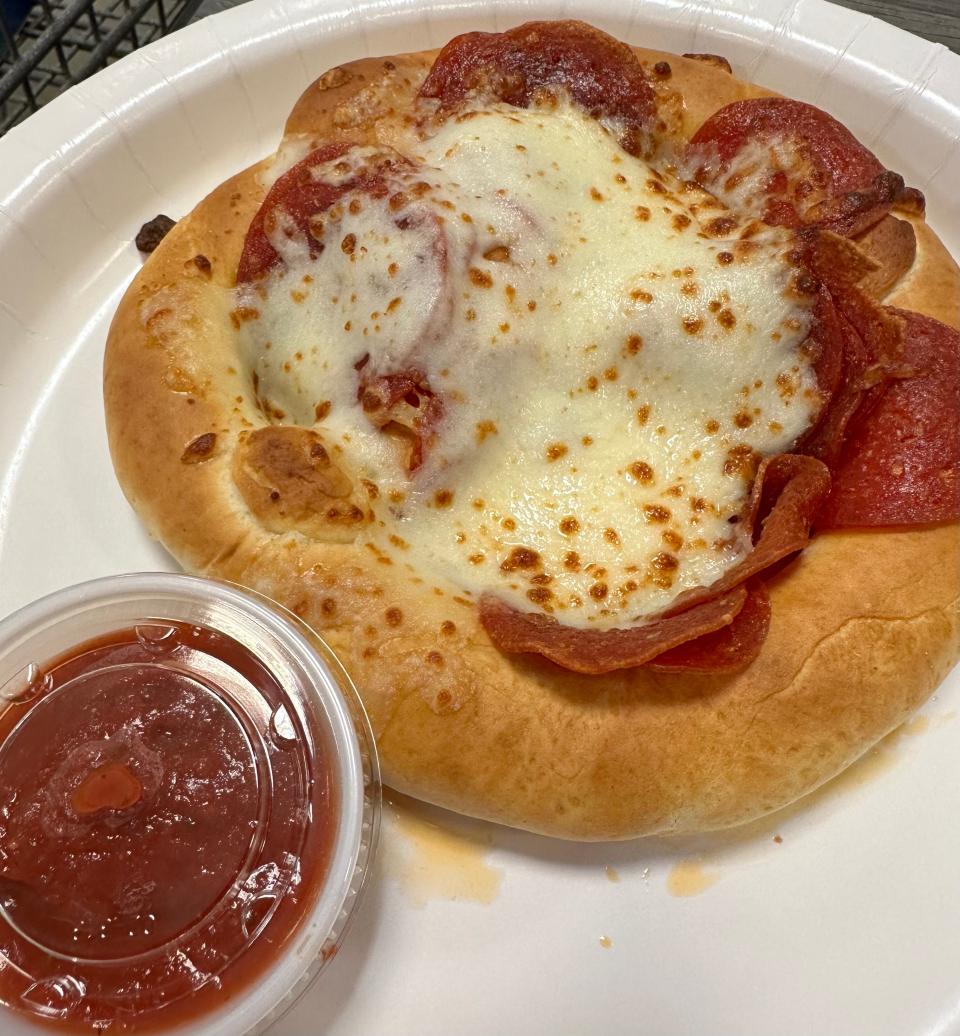It arrived looking much different than the menu photo, and this pizza pretzel would be better if the ingredients somehow were tucked inside rather than simply thrown on top.
