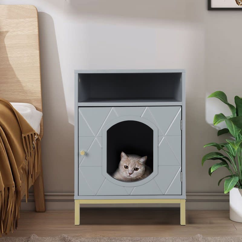 <p><a href="https://go.redirectingat.com?id=74968X1596630&url=https%3A%2F%2Fwww.wayfair.com%2F--%2Fpdp%2Ftucker-murphy-pet%25e2%2584%25a2--pet-side-table-cat-litter-box-enclosure-litter-box-furniture-hidden-cat-house-covered-nightstand-cats-furniture-cabinet-x110088966-l1175-w009977855.html&sref=https%3A%2F%2Fwww.cosmopolitan.com%2Flifestyle%2Fg44106762%2Fbest-cat-litter-box-furniture%2F" rel="nofollow noopener" target="_blank" data-ylk="slk:Shop Now;elm:context_link;itc:0;sec:content-canvas" class="link rapid-noclick-resp">Shop Now</a></p><p>Litter Box Nightstand</p><p>$119.99</p><p>wayfair.com</p><span class="copyright">Tucker Murphy Pet</span>