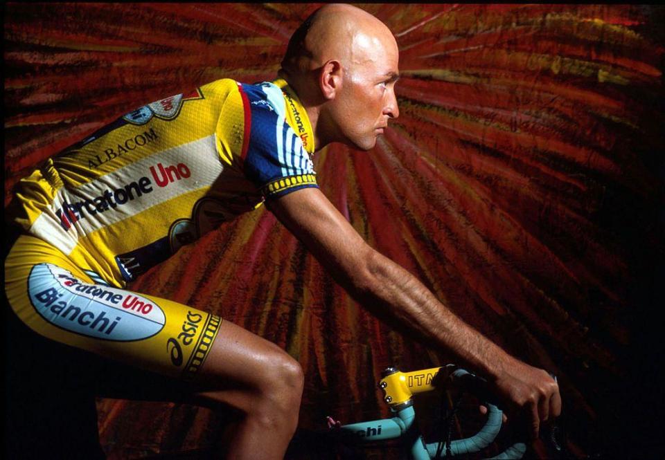 Marco Pantani posing for an artistic shot on a bicycle