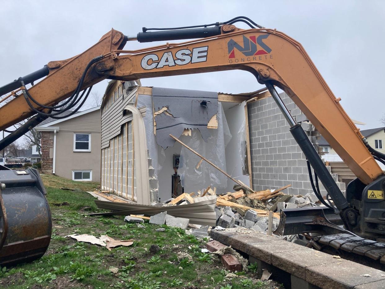 Demotion underway of a large cinderblock garage built without permits on the Langhorne-Yardley Road property owned by Curtis G. Smith. Middletown license and inspection department was forced to raze the building on March 5, 2024.