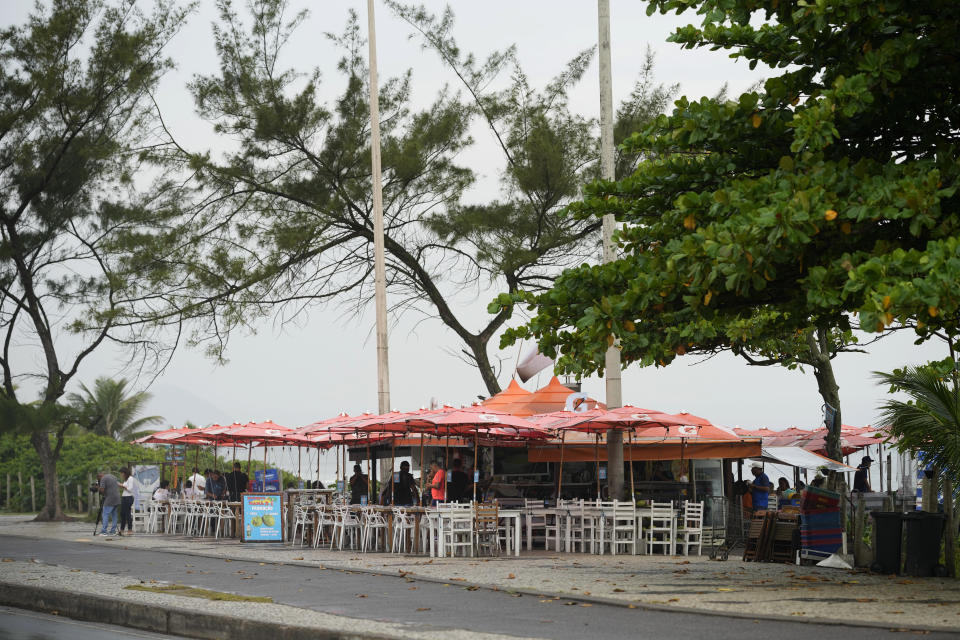 The food and bar kiosk "Nana 2," where four doctors were shot, is open for business on the beach in the Barra de Tijuca neighborhood of Rio de Janeiro, Brazil, Thursday, Oct. 5, 2023. Three of the doctors died in the overnight shooting. (AP Photo/Silvia Izquierdo)