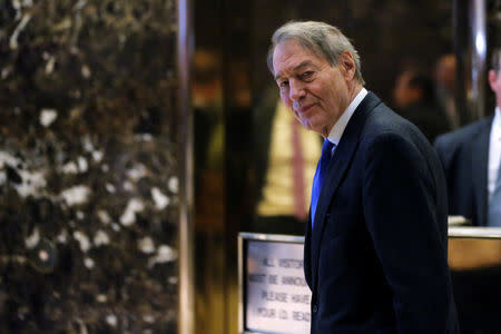 FILE PHOTO: CBS news host Charlie Rose departs after meeting with U.S. President-elect Donald Trump at Trump Tower in the Manhattan borough of New York, U.S. on November 21, 2016. REUTERS/Lucas Jackson/File Photo