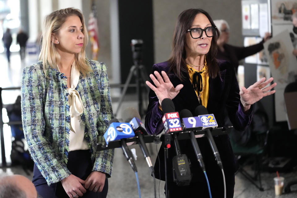 Attorneys for R. Kelly, Jennifer Bonjean, right, and Ashley Cohen talk to reporters at the Dirksen Federal Building after Kelly's sentencing hearing Thursday, Feb. 23, 2023, in Chicago. (AP Photo/Charles Rex Arbogast)