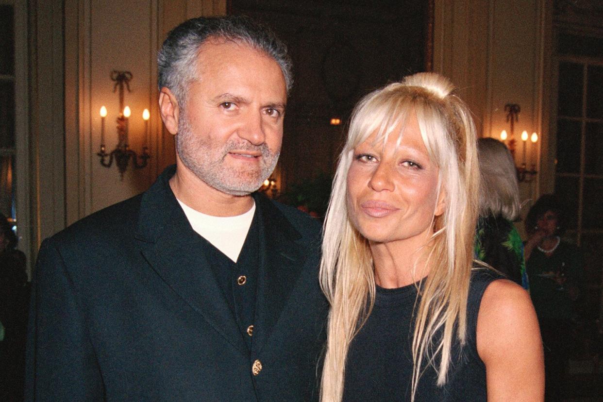 Gianni and Donatella Versace at a Versace fashion show