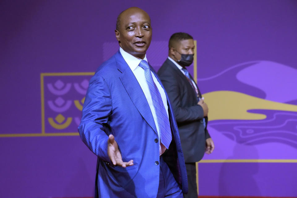 FILE - Patrice Motsepe, the President of the Confederation of African Football, arrives for the 2022 soccer World Cup draw at the Doha Exhibition and Convention Center in Doha, Qatar, on April 1, 2022. (AP Photo/Darko Bandic, File)