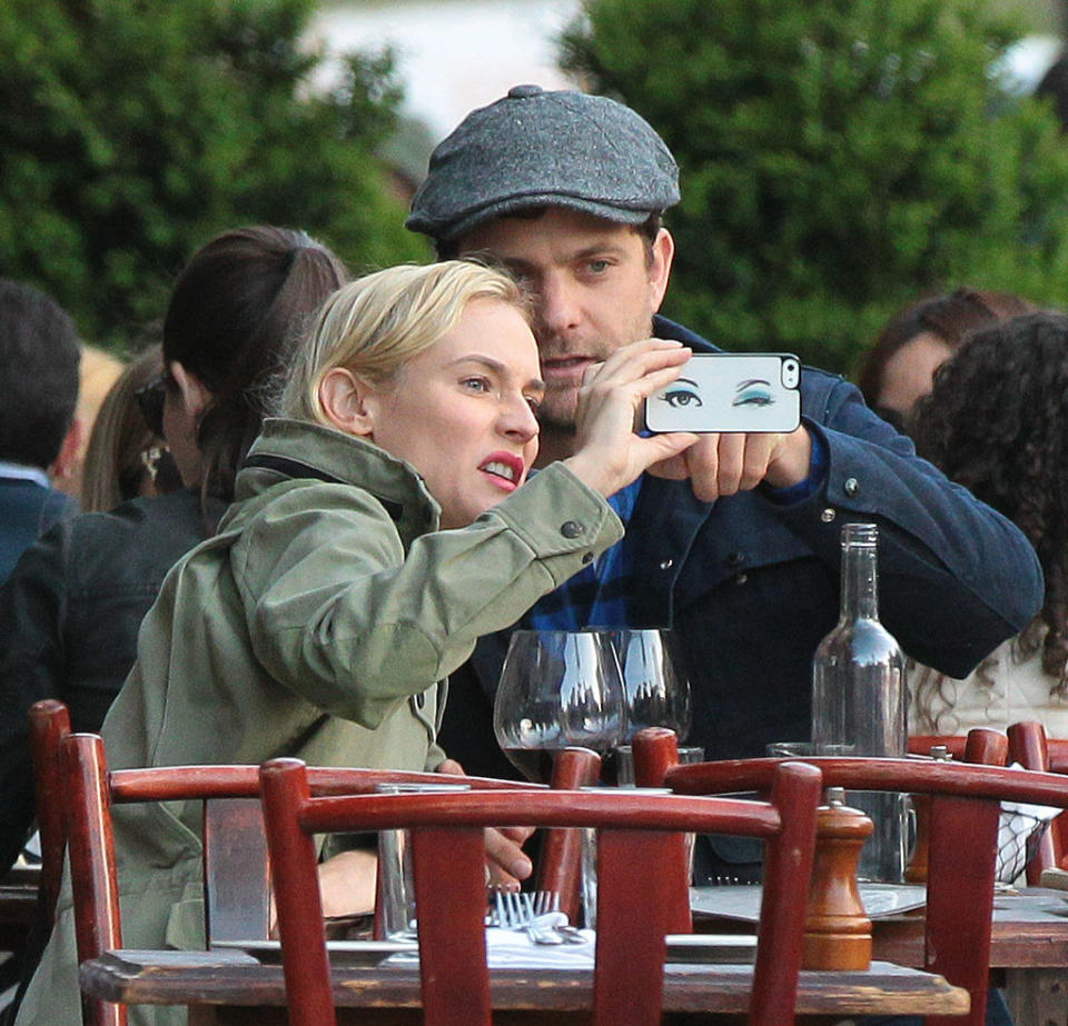 Diane and Joshua sitting and taking a selfie