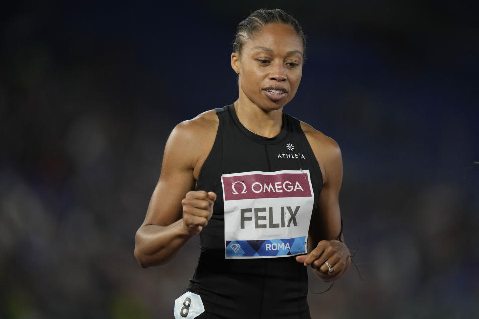 Allyson Felix of the United States reacts at the finish line of the women's 200-meter competition at the Golden Gala Pietro Mennea IAAF Diamond League athletics meeting in Rome, Thursday, June 9, 2022. (AP Photo/Andrew Medichini)