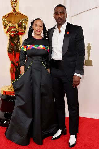 <p>Mike Coppola/Getty</p> Amatus Sami-Karim (left) and Mahershala Ali attend the 96th Annual Academy Awards on March 10, 2024