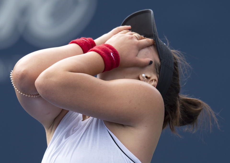 Bianca Andreescu, of Canada, celebrates after defeating Sofia Kenin, of the United States during the Rogers Cup women’s tennis tournament Saturday, Aug. 10, 2019, in Toronto. (Frank Gunn/The Canadian Press via AP)