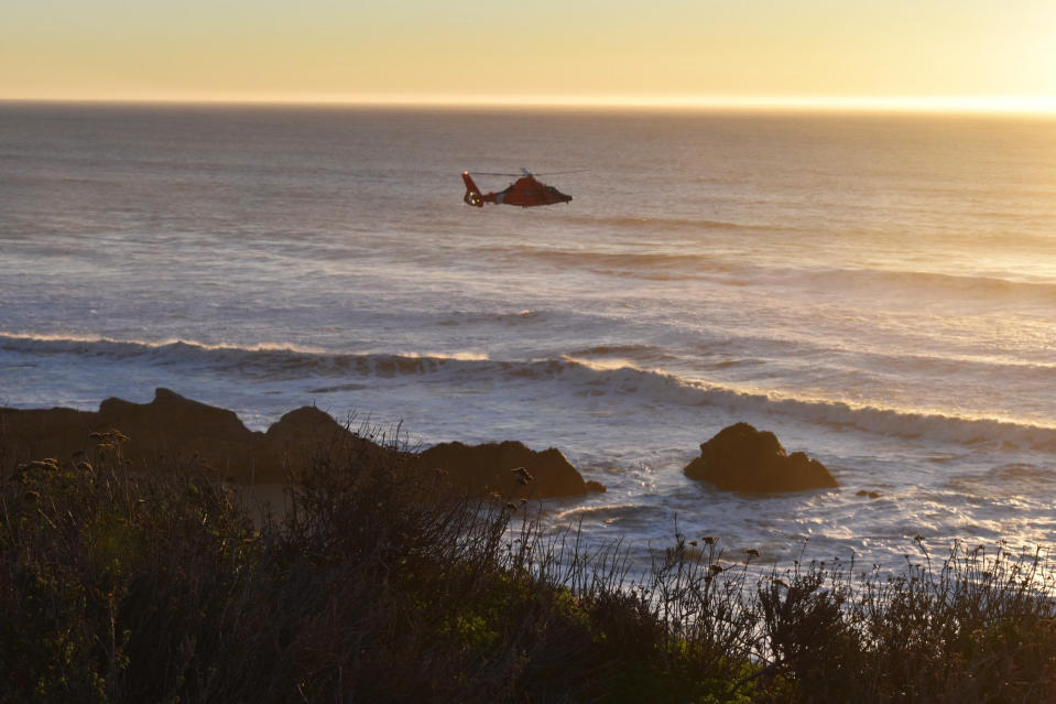 Emergency workers look for a child who was swept out to sea at Cowell Ranch State Beach in San Mateo County, Calif., on Jan. 18, 2020. (Cal Fire via Twitter)