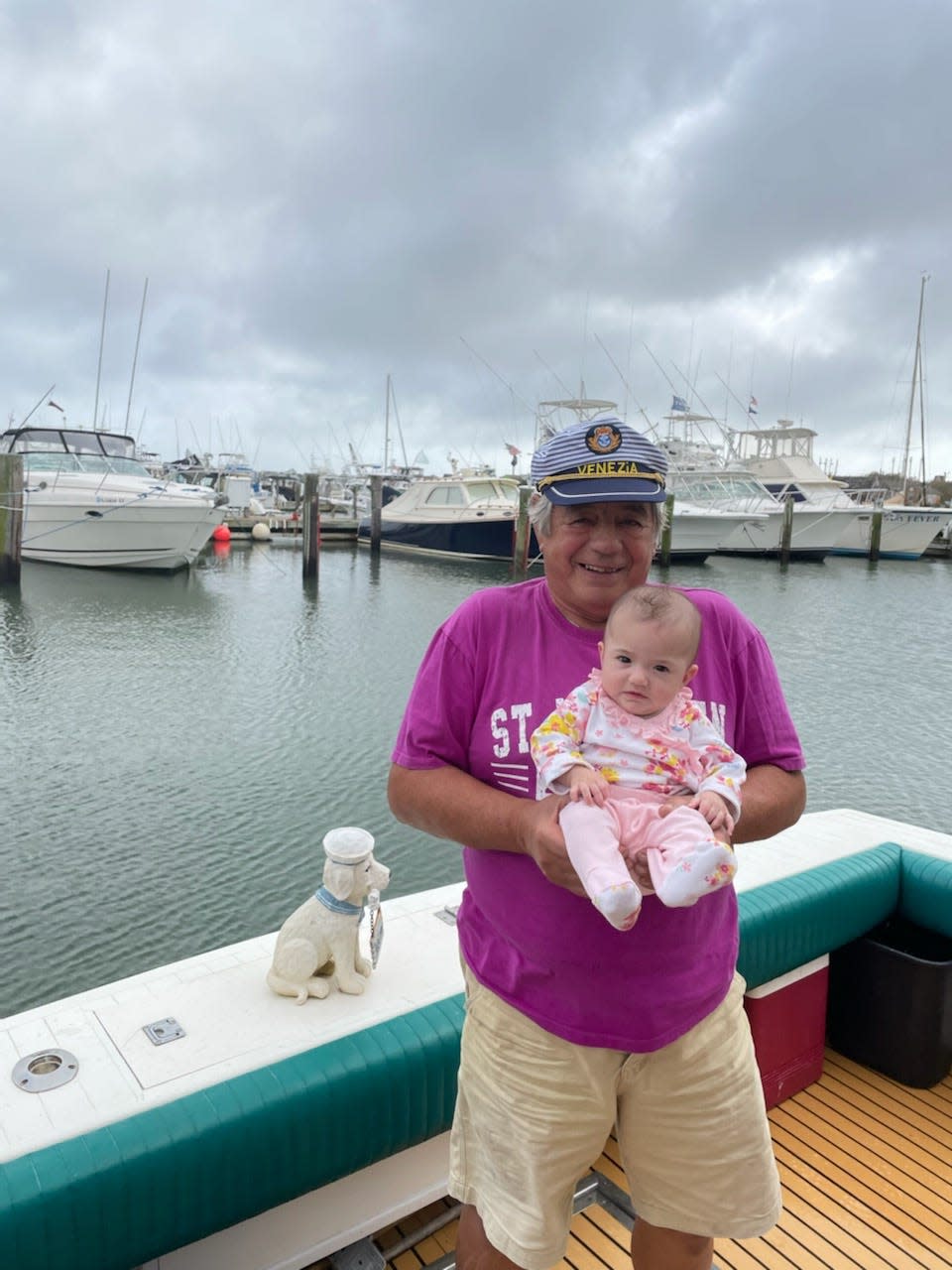 Joe DiTomasso poses on a boat in a family photo. DiTomasso, 76, of Cape May, New Jersey, was one of two men that went missing during a sailboat trip to Florida and was rescued this week by a tanker amid a massive Coast Guard search.