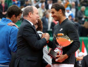 Tennis - Monte Carlo Masters - Monaco - 23/04/17 - Prince Albert II of Monaco shakes hand with Rafael Nadal of Spain after winning his final tennis match against his compatriot Albert Ramos-Vinolas (L) at the Monte Carlo Masters. REUTERS/Eric Gaillard