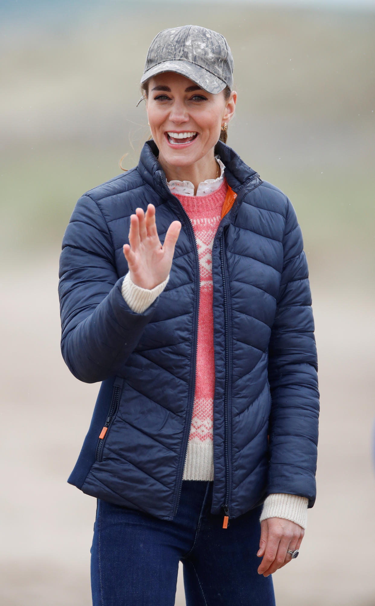 The Duchess of Cambridge waves during a visit to the beach at St Andrews. Picture date: Wednesday May 26, 2021.