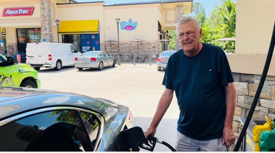 Daytona Beach motorist Paul DuBois refuels his car at the RaceTrac gas station on the corner of Williamson Boulevard and Beville Road on Monday, May 16, 2022. Even though gas prices are at a record high, he said the gas shortages of the 1970s were much worse.