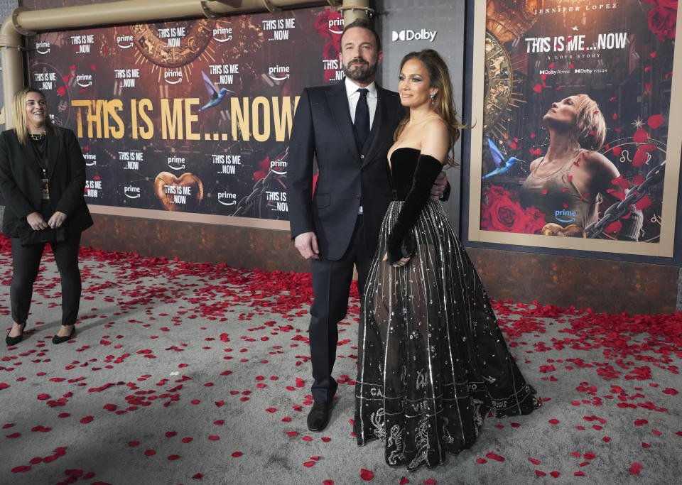 Ben Affleck, left, and Jennifer Lopez arrive at the premiere of "This Is Me... Now: A Love Story" on Tuesday, Feb. 13, 2024, at the Dolby Theatre in Los Angeles. (Photo by Jordan Strauss/Invision/AP)