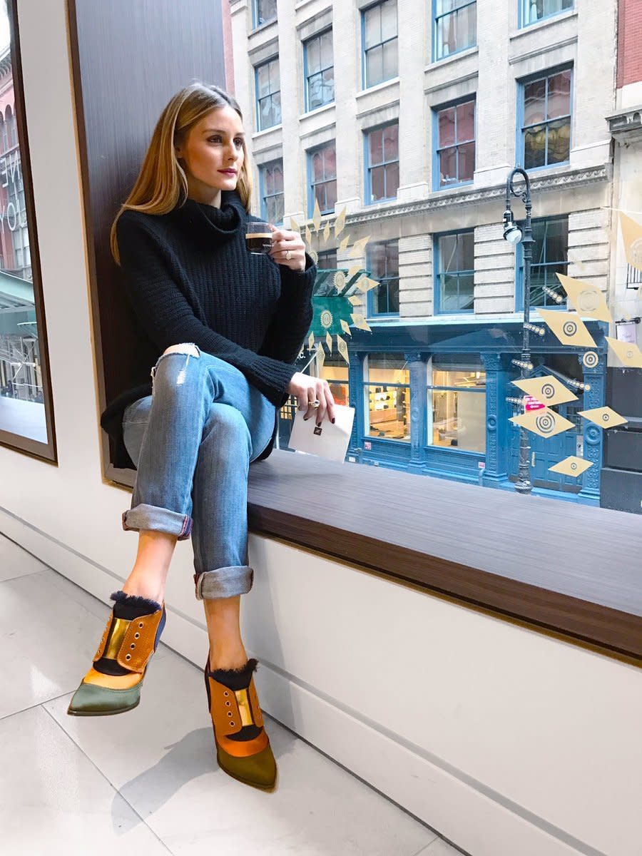 Olivia Palermo enjoying Nespresso coffee while holiday shopping at their Soho boutique