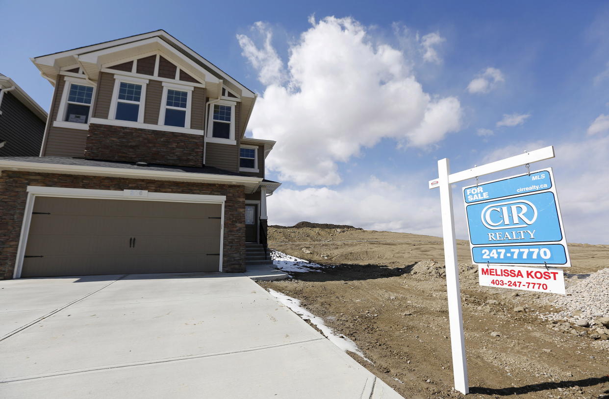 A newly built house for sale is seen in Calgary, Alberta, April 7, 2015. House prices have fallen in Calgary after the price of oil plummeted late last year according to local media. REUTERS/Todd Korol 