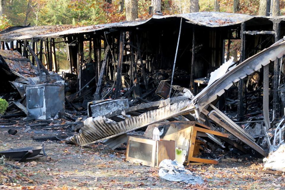 The aftermath of a Wednesday, November 1, 2023, fire at 254 Lakewood Road in the Oak Grove Mobile Home Park in Plumsted Township.