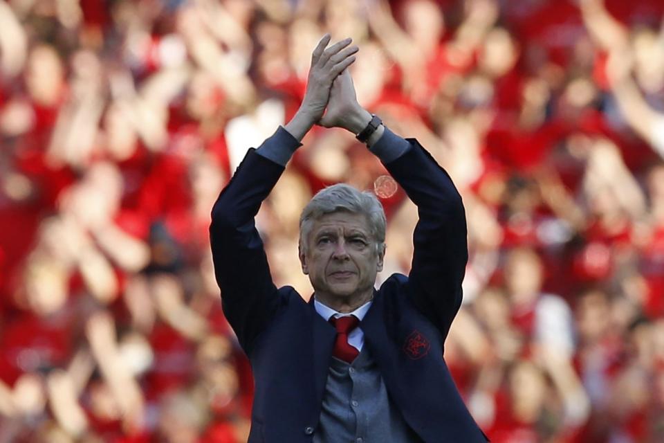 Red to blue? Arsenal boss Arsene Wenger has been linked with Everton today