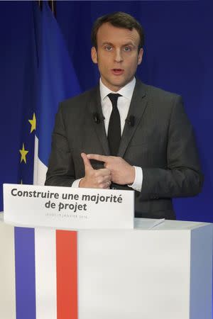 Former French minister Emmanuel Macron, head of the political movement En Marche !, or Forward !, and candidate for the 2017 French presidential election, attends a news conference at his campaign headquarters in Paris, France, January 19, 2017. REUTERS/Philippe Wojazer