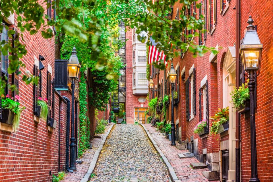 <p>There's history on every corner of Boston—especially Acorn Street. It's one of the most photographed places in the city, as it gives visitors a taste of old England. The brick buildings, cobblestones, and lanterns all are reminiscent of the most charming parts of Britain. </p>