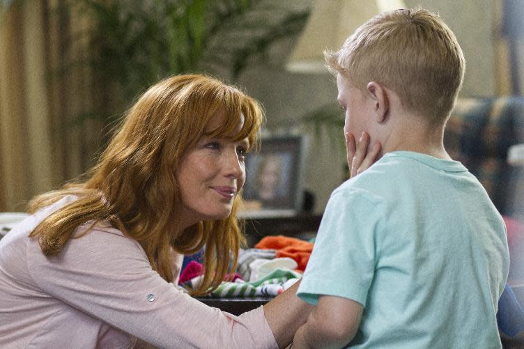 This image released by Sony Pictures shows Kelly Reilly, left, Connor Corum in a scene from "Heaven Is For Real." (AP Photo/Sony Pictures, Allen Fraser)