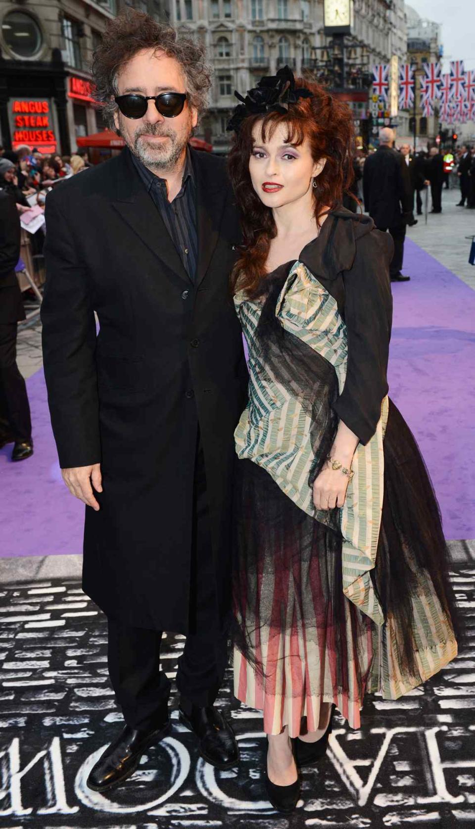 Tim Burton and Helena Bonham Carter attend the UK premiere of "Dark Shadows" at The Empire Leicester Square on May 9, 2012 in London, England