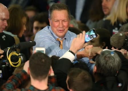 Republican U.S. presidential candidate Governor John Kasich greets supporters after speaking about the results of the Ohio primary election during a campaign rally in Berea, Ohio, March 15, 2016. REUTERS/Aaron Josefczyk