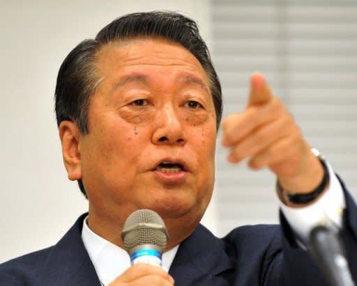 Veteran Japanese powerbroker Ichiro Ozawa (pictured in 2011) and 51 of his followers said on Monday they will leave the country's ruling party over a sales tax hike. The 52 lawmakers -- 40 from the lower house and 12 from the upper chamber of parliament -- submitted their resignations to Prime Minister Yoshihiko Noda's Democratic Party of Japan