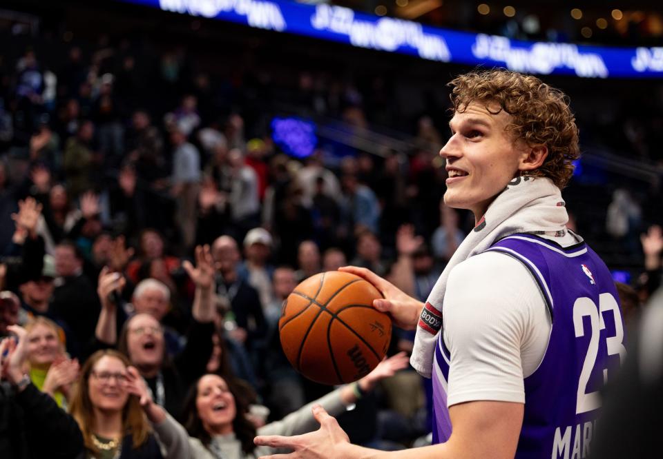 Utah Jazz forward Lauri Markkanen (23) looks into the crowd to give the game-ball after a Jazz victory in the NBA basketball game between the Utah Jazz and the Oklahoma City Thunder at the Delta Center in Salt Lake City on Tuesday, Feb. 6, 2024. | Megan Nielsen, Deseret News