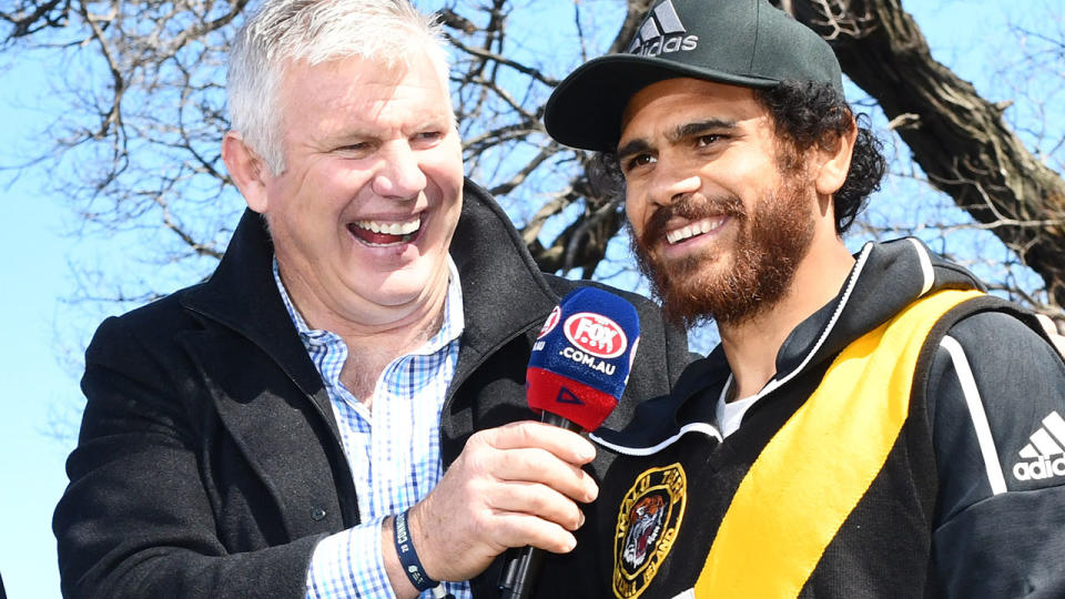 Danny Frawley and Cyril Rioli, pictured here before the AFL grand final in 2018.