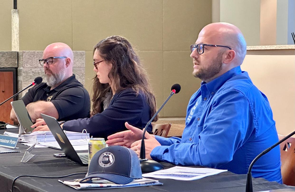 County Commissioner David O'Keefe (right) makes a point during a blueprint Board of Directors meeting Sept. 21, 2023, at City Hall. Also pictured from left are County Commissioner Brian Welch and City Commissioner Jack Porter.