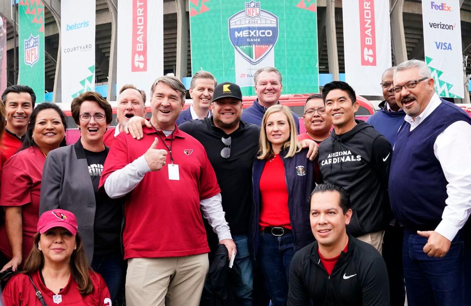 Phoenix Mayor Kate Gallego (center) and Marco Lopez (far left), who lost the Democratic nomination for governor to Katie Hobbs in August, were among those attending Monday night's game.