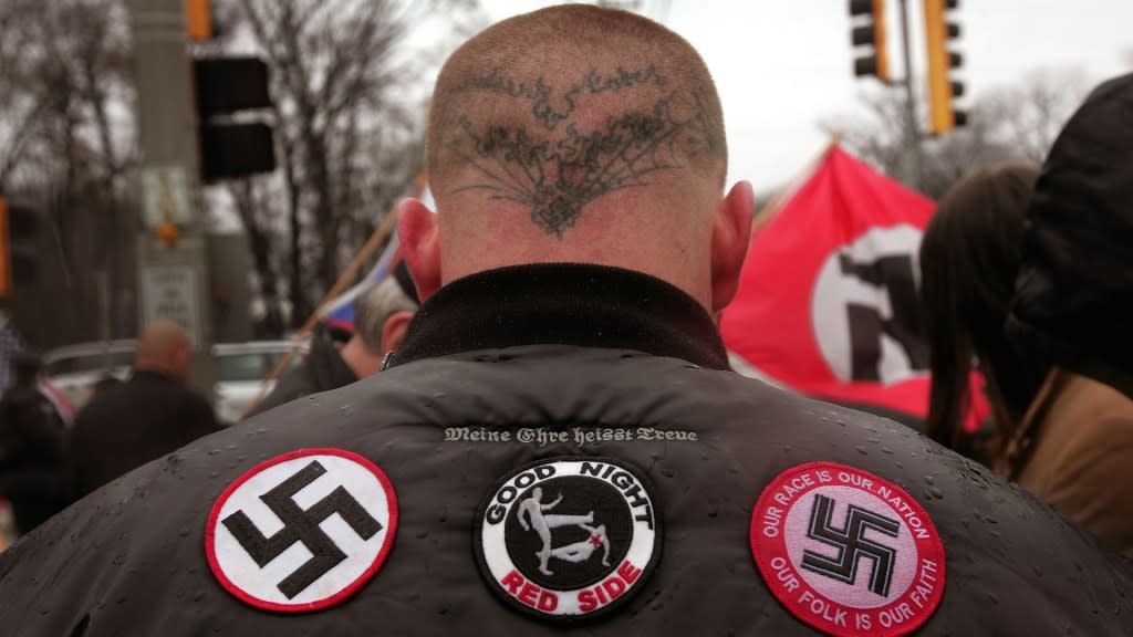 Neo-Nazi protestors organized by the National Socialist Movement demonstrate near where the grand opening ceremonies were held for the Illinois Holocaust Museum & Education Center. (Photo by Scott Olson/Getty Images)