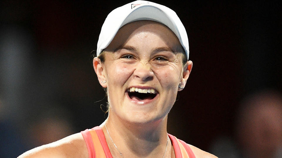 Ash Barty (pictured) smiles after her victory in Adelaide.