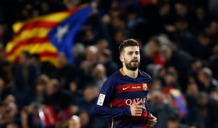 Football Soccer - FC Barcelona v Real Madrid - La Liga - Camp Nou, Barcelona - 2/4/16 Barcelona's Gerard Pique celebrates scoring their first goal with teammates Reuters / Juan Medina Livepic