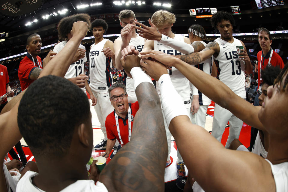 Head coach Joe Mantegna of USA Team gathers his squad before the game between USA Team and World Team during the Nike Hoop Summit at Moda Center on April 08, 2022, in Portland, Oregon.