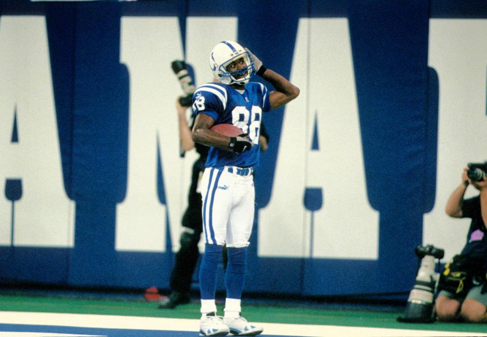 Oct 31, 1999; Indianapolis, IN, USA; FILE PHOTO: Indianapolis Colts wide receiver Marvin Harrison (88) celebrates a touchdown against the Dallas Cowboys at the RCA Dome. Mandatory Credit: James D. Smith-USA TODAY Sports
