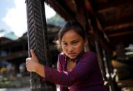 The Wider Image: Doctors scale rockslides, invoke gods to vaccinate Himalayan villages