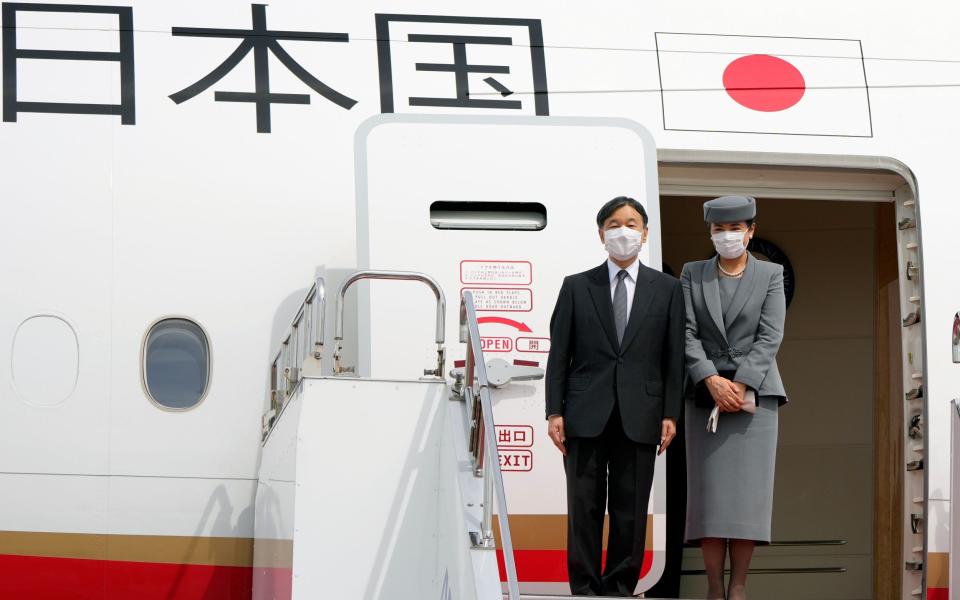 Emperor Naruhito and Empress Masako prepare to board a special flight to London - Franck Robichon/EPA-EFE/Shutterstock