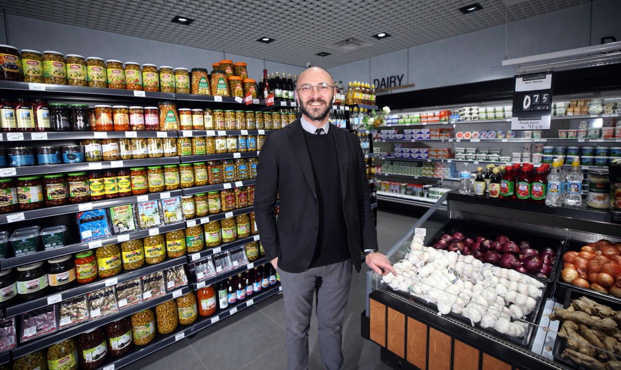 Ilker Yildirim, owner of Gourmet Fine Foods by Istanbul Market, stands inside the new location, 5221 Bethel Center Mall in northwest Columbus. Store hours are 9:30 a.m. to 9:30 p.m. daily.