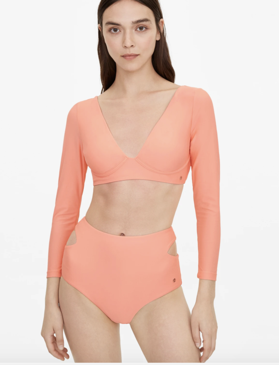 Pomelo open back long sleeve swim top - Coral, S$29. PHOTO: Pomelo