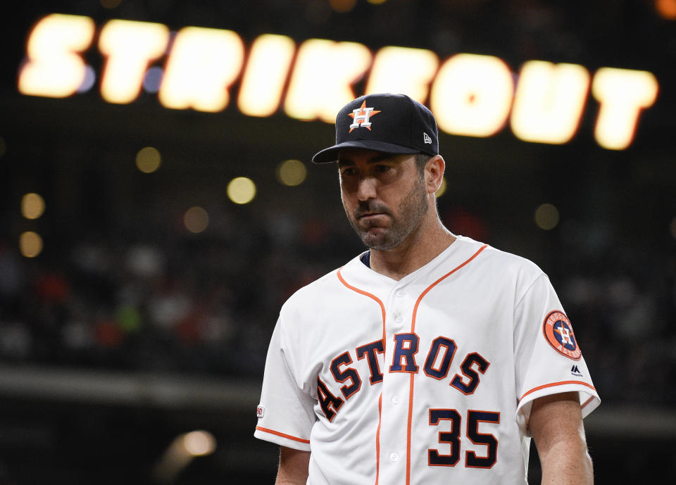 Houston Astros starting pitcher Justin Verlander walks to the dugout after striking out Milwaukee Brewers' Orlando Arcia to end the top of the fifth inning of a baseball game Wednesday, June 12, 2019, in Houston. (AP Photo/Eric Christian Smith)