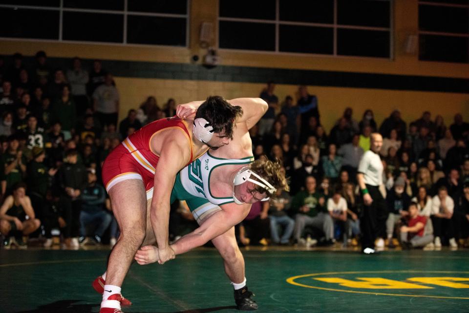 Bergen Catholic wrestling at St. Joseph on Friday, January 28, 2022. (Left) Remy Brancato (BC) on his way to defeating Aidan Schlett (SJR) in their 215 pound match. 